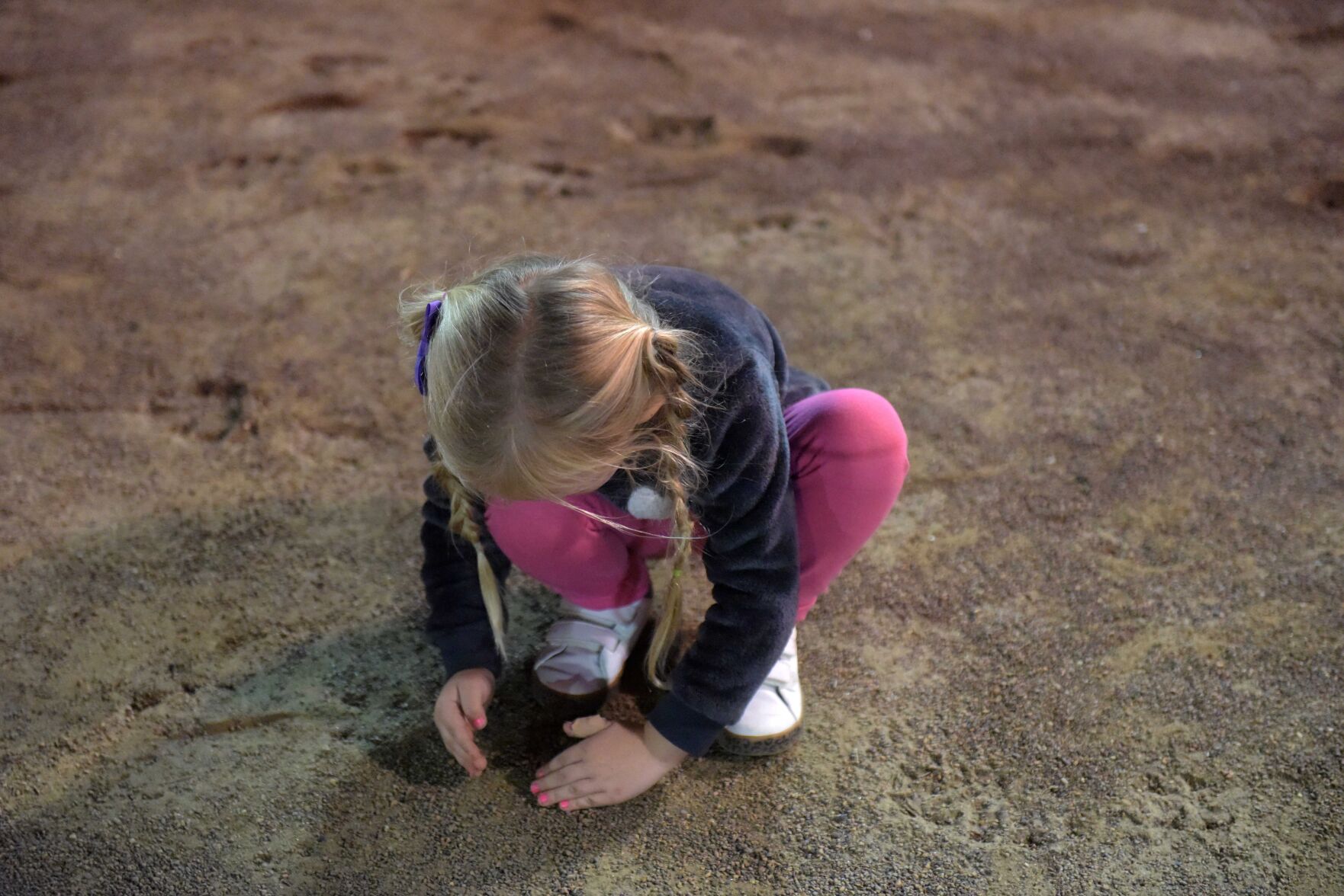 Elby Meyer, 4, plays with sand